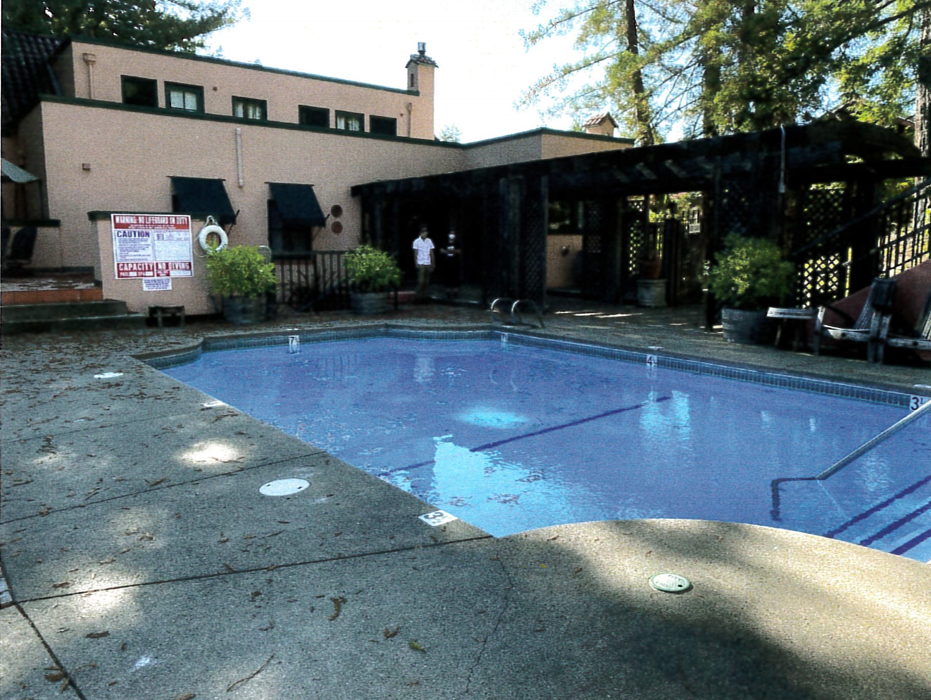 Closer view of east facade and pool area